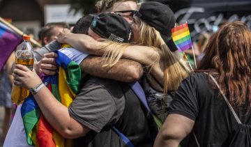 man-woman-hugging-lbgt-coming out